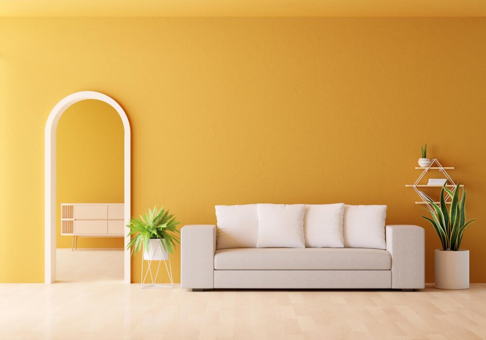 Painting Services in Bannerghatta, professional painters in Bangalore, yellow wall with sofa