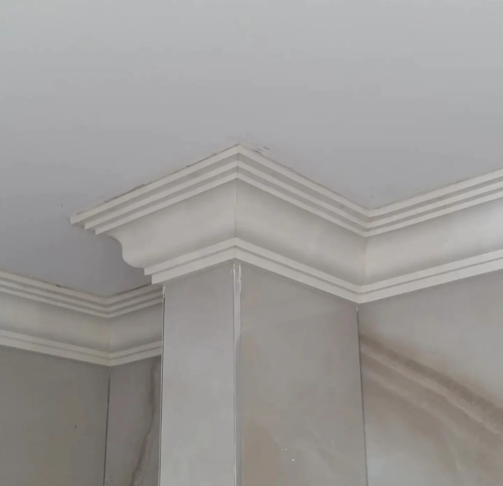 Crown molding - Crowning Glory: Elevating Your Home's Elegance with Diverse Styles of Crown Molding and Expert Tips for a Polished Interior - Paintmywalls traditional crown molding